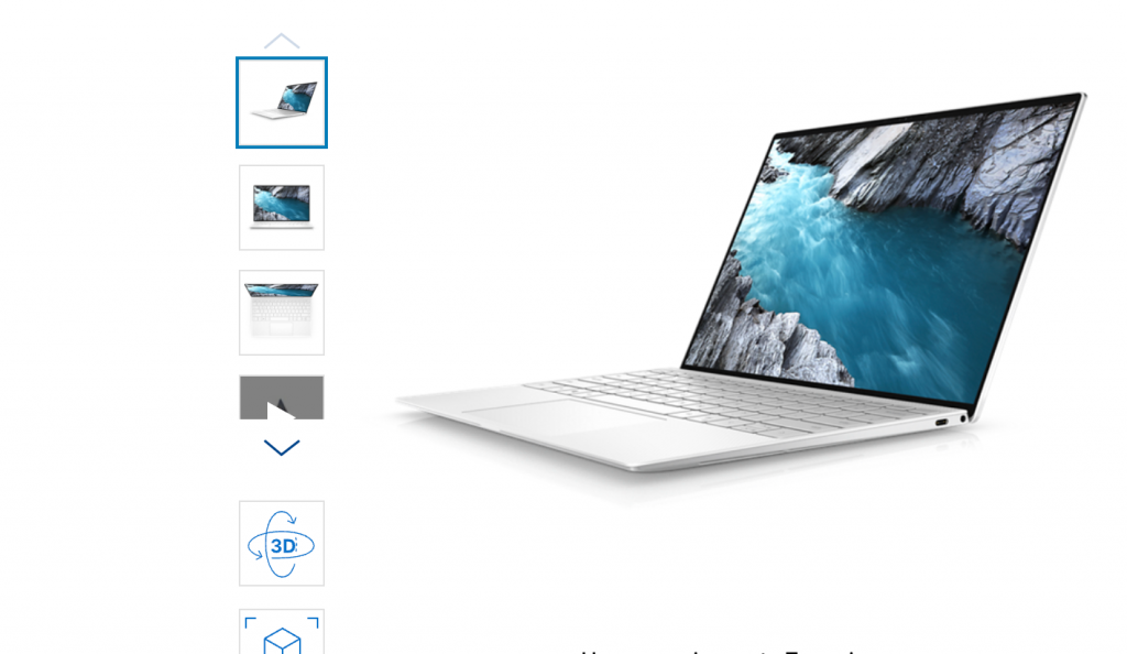 Dell XPS 13 in white background with a natural landscape displaying on its screen